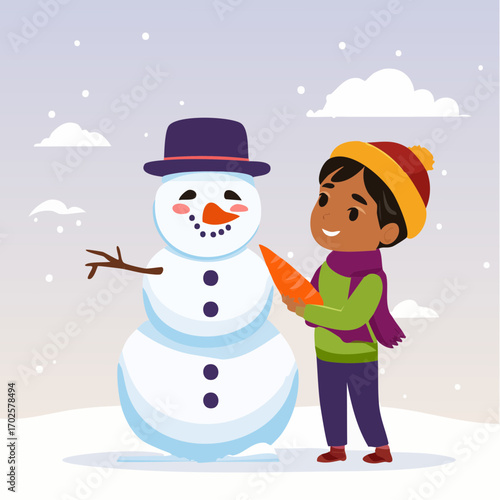 Joyful child happily building a snowman, crafting winter fun with a carrot nose.