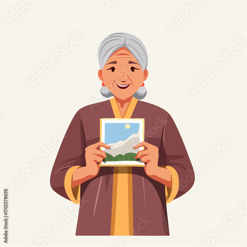 Joyful elderly woman proudly displays a cherished landscape photograph, sharing a warm memory.