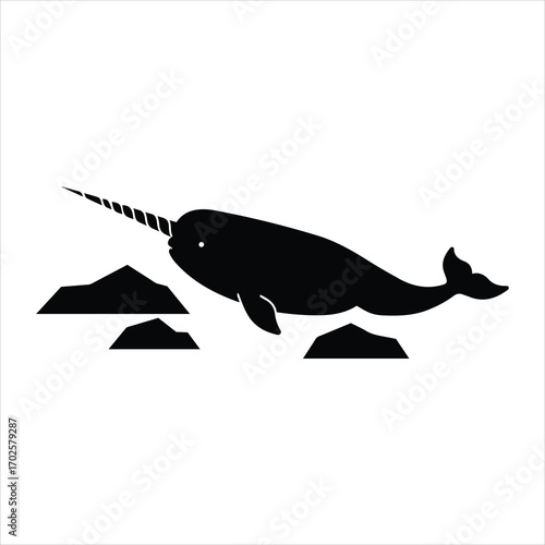 Silhouetted narwhal majestic unicorn of the sea amongst arctic ice floes