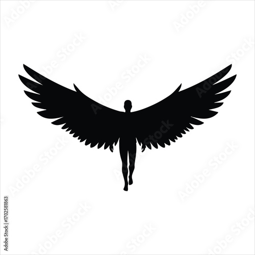 Silhouette of an angel with large open wings in flight or standing tall