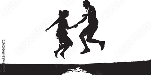 Silhouette of a happy couple jumping in the air holding hands over a textured ground line happiness