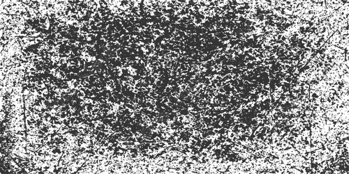 Close-up macro of a black and white granite rock surface with a textured abstract pattern