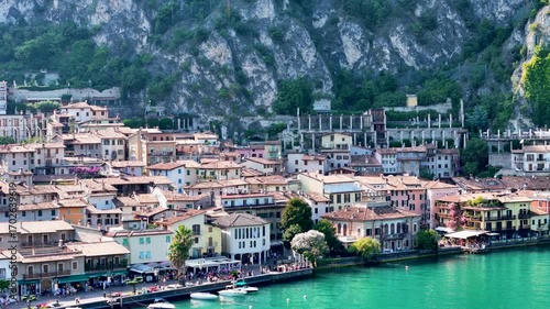 Limone sul Garda old town. Aerial 4K video footage of panoramic lake Garda and Italian Alps mountains. Lombardy drone landscape of downtown
