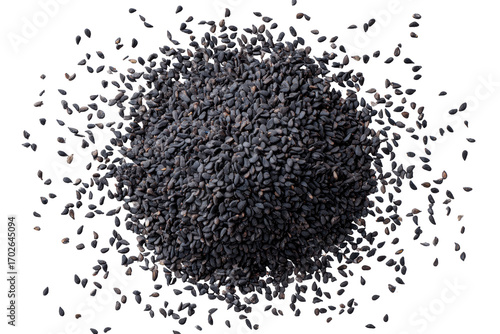 Dark, dense pile of small, dark seeds, scattered