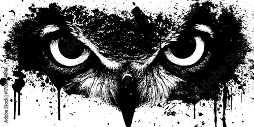 Black ink grunge owl silhouette with splattered and dripping ink effects