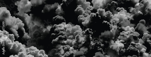 Dark moody sky filled with turbulent storm clouds in dramatic detail