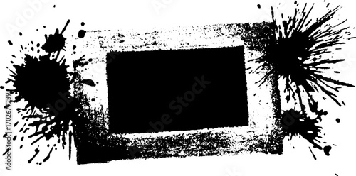 Grunge black ink silhouette with irregular frame and splatter accents for urban design