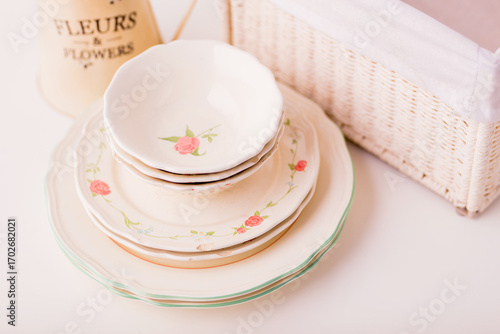 Closeup of porcelain plates and bowls