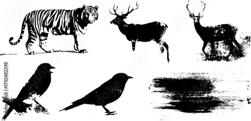 Abstract silhouettes of tiger, deer, and birds in grunge ink style for artistic design