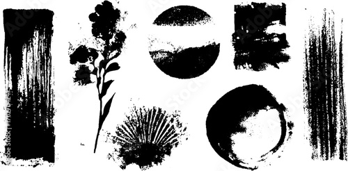 Artistic set of black ink silhouettes and grunge fonts for creative design