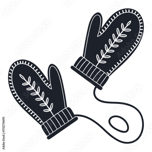 A pair of dark blue knitted mittens with a white leaf pattern and ribbed cuffs connected by a string on a white background