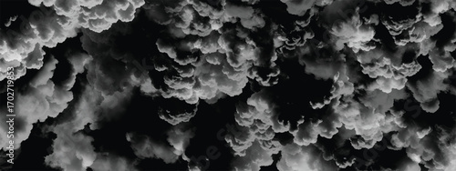 Surreal stormy sky texture with dense moody cloud formations in grayscale