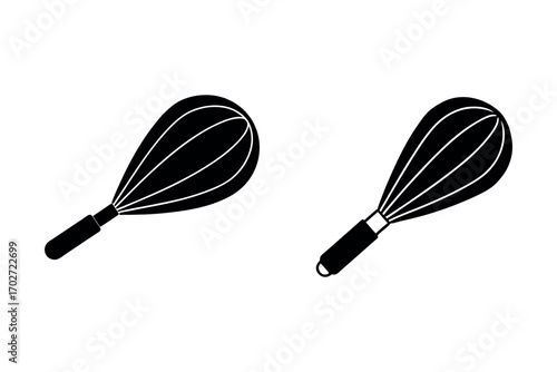 two black whisks side by side in minimalist silhouette