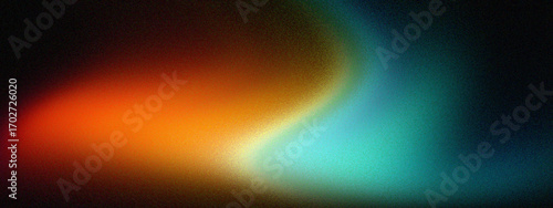 Abstract swirl of vibrant orange and teal light blending together on a dark background