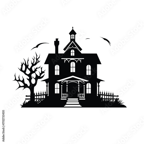 Spooky haunted victorian mansion silhouette with bare tree and flying birds at dusk silhouette