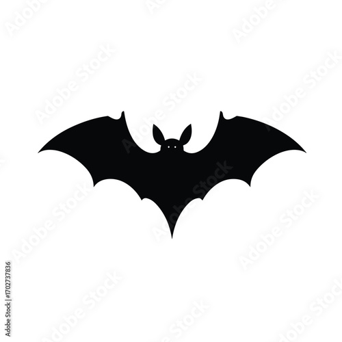 Silhouette of a flying bat spreading its wings for halloween silhouette