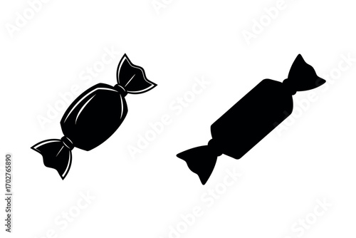 two candies wrapped in foil with ribbon silhouette