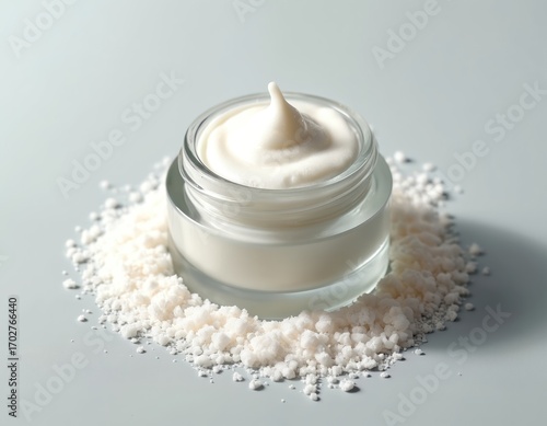 Glass jar filled with white skincare cream featuring urea granules. Minimalist aesthetic emphasizes purity, smooth hydration for body care. Gentle, natural, organic formula promotes soft, glowing,