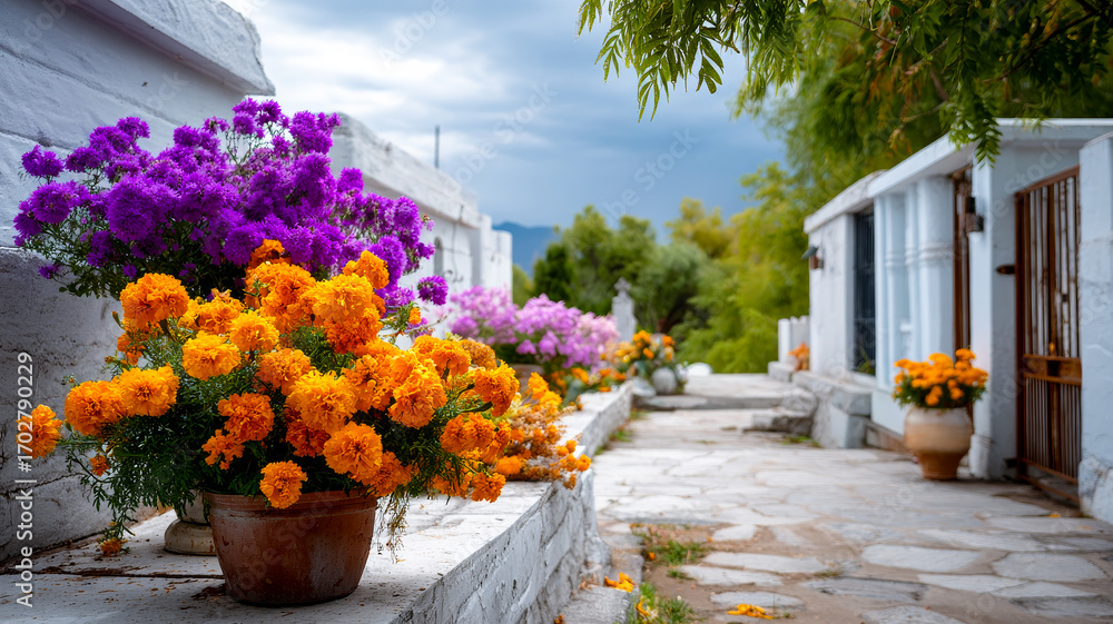 Fototapeta premium Colorful flowers brighten garden pathway. Vibrant purple and orange flowers adorn a serene garden path under a cloudy sky, inviting visitors to explore.