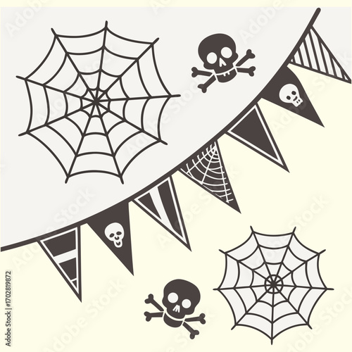 Halloween decorations with spider webs skulls and bunting flags
