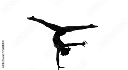 Silhouette of a gymnast performing a graceful handstand with legs extended in balance