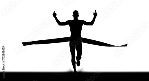 Triumphant silhouette of a runner crossing the finish line expressing victory and achievement
