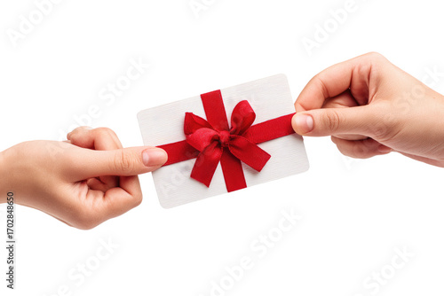 Hands exchanging a gift card with a red ribbon
