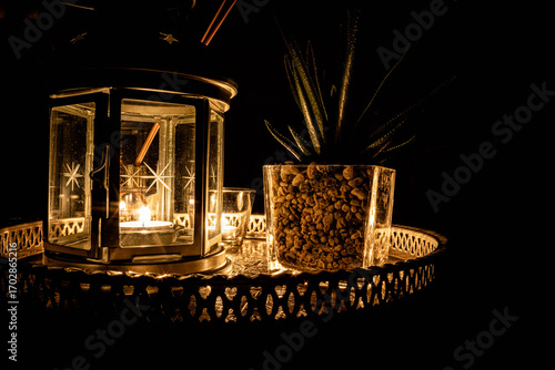 elegant decorative tray with burning candles and aroma diffuser for wellness, meditation, or luxury interior design projects
