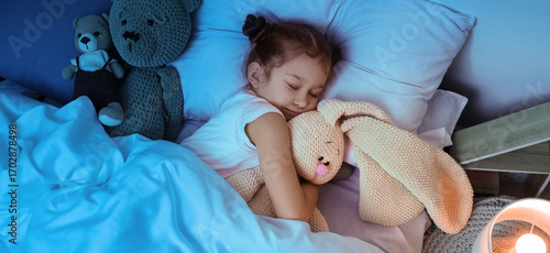 Cute little girl with knitt...