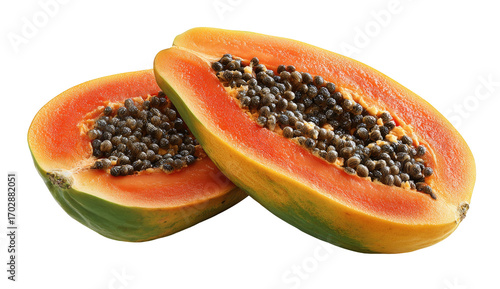 Two halves of a papaya fruit, close-up.  Bright orange-red flesh,  green rind,  dark brown seeds.  Fresh tropical fruit