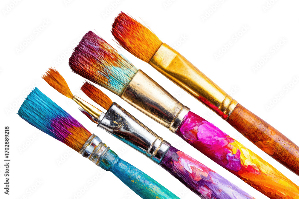 Fototapeta premium Colorful paintbrushes in various shapes and sizes, angled against a black background. Each brush displays vibrant, mixed paint colors on the bristles