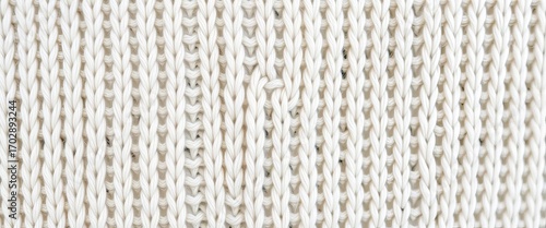 Close-up of textured white knit wool sweater fabric , wintery, cashmere