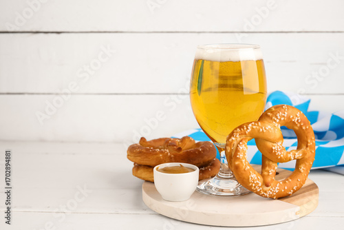 Board with pretzels and gla...