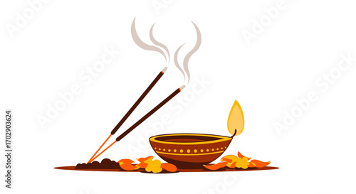 A lit diya oil lamp with incense sticks burning, surrounded by autumnal leaves.