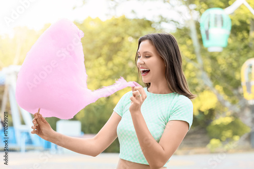 Happy young woman enjoying ...