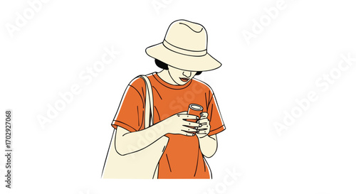 Young woman in stylish hat and orange shirt engrossed in smartphone, carrying tote bag
