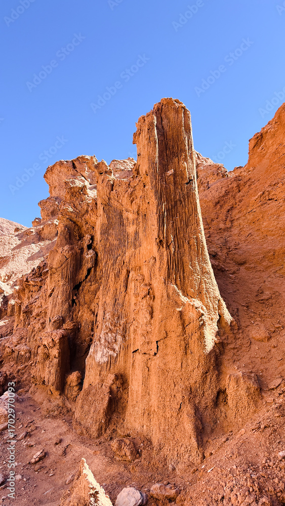 Fototapeta premium Sandstone and stone layer structures rocks formations creates the unique shape and texture in Atacama Desert close to San Pedro de Atacama in Chile. Background