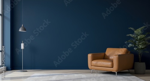 Modern living room interior design with tan leather armchair, blue wall, and floor lamp