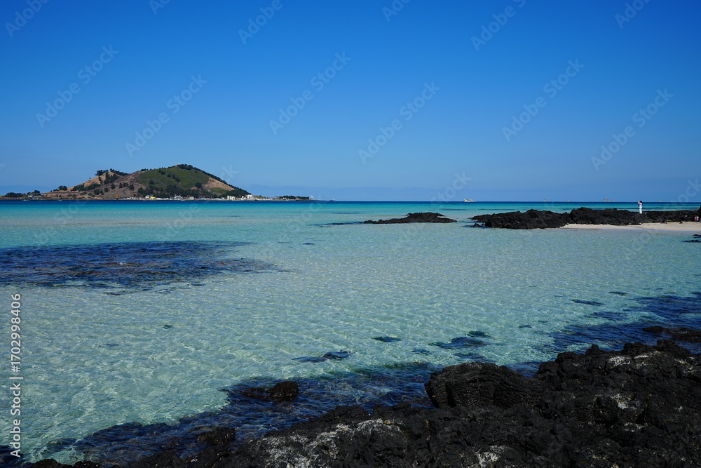 Fototapeta premium fine sea view with clear water and far island