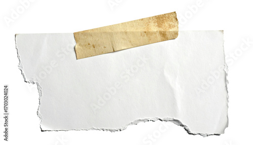 A torn piece of white paper with a tan adhesive tape