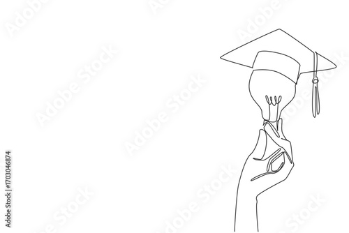 Single one line drawing hand holding a bulb on top of which is a graduation cap. A symbol of the desire to achieve the highest education. Holding Bulb. Continuous line design graphic illustration