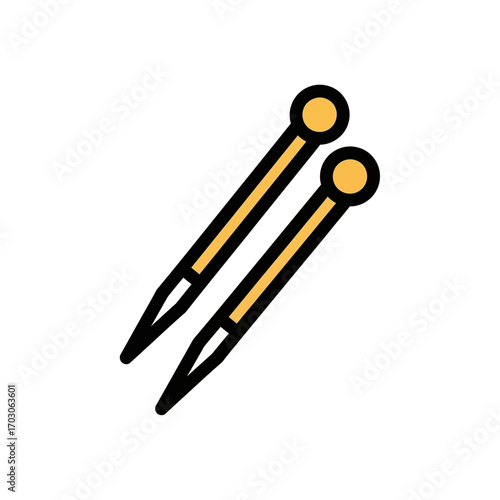 Knitting needles rest diagonally on plain background