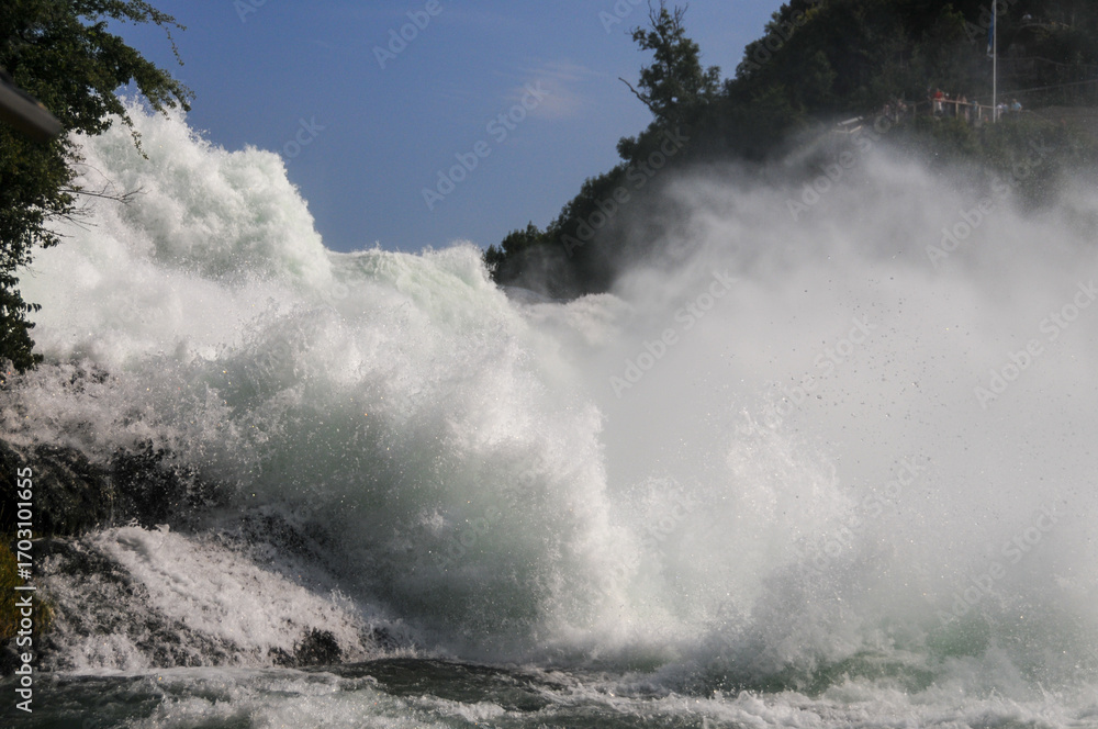 Obraz premium Scenic outlook over the Rheinfall, one of the major water falls in the Rhein river, on the Swiss, German border.