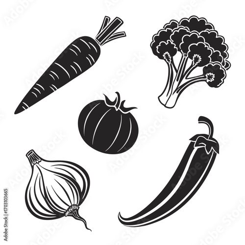 A collection of five fresh healthy vegetables including a carrot broccoli tomato onion and chili pepper