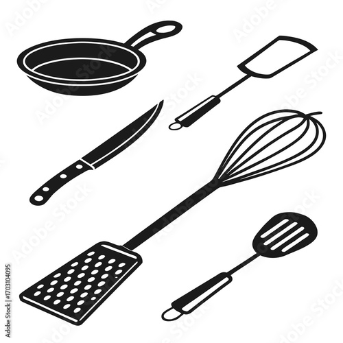 Collection of black kitchen utensils including a frying pan whisk grater knife and spatulas on a white background
