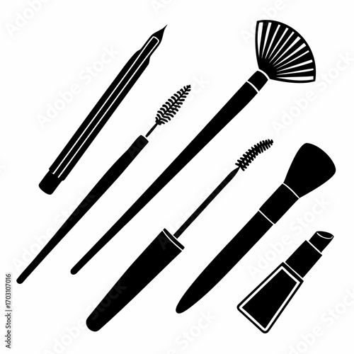 Collection of black silhouette cosmetic makeup tools including brushes and lipstick on a white background