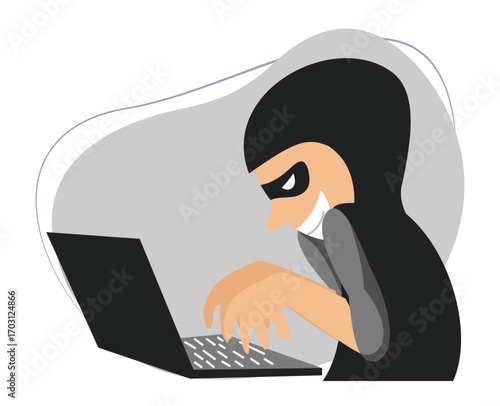 hacker in a black hoodie sitting in front of a laptop