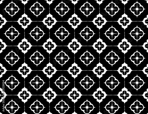 Geometric Tiles: A modern, black and white pattern of intricately designed geometric tiles. The contrast in the image draws attention to the detailed floral motif, creating a harmonious display.