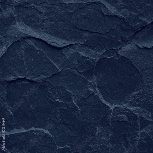 Dark slate rock texture close-up