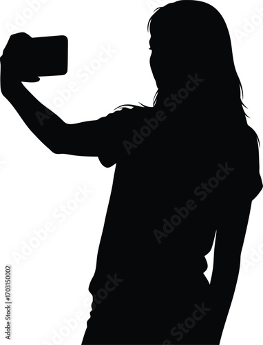 Silhouette of a young woman taking a self-portrait photo with her smartphone camera held up vector
